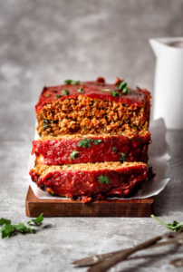 A beautifully glazed and perfectly baked meat loaf, ready to serve.