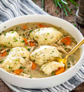 Homemade chicken and dumplings in a bowl.